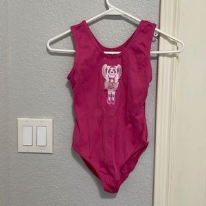 Pink ballet leotard .